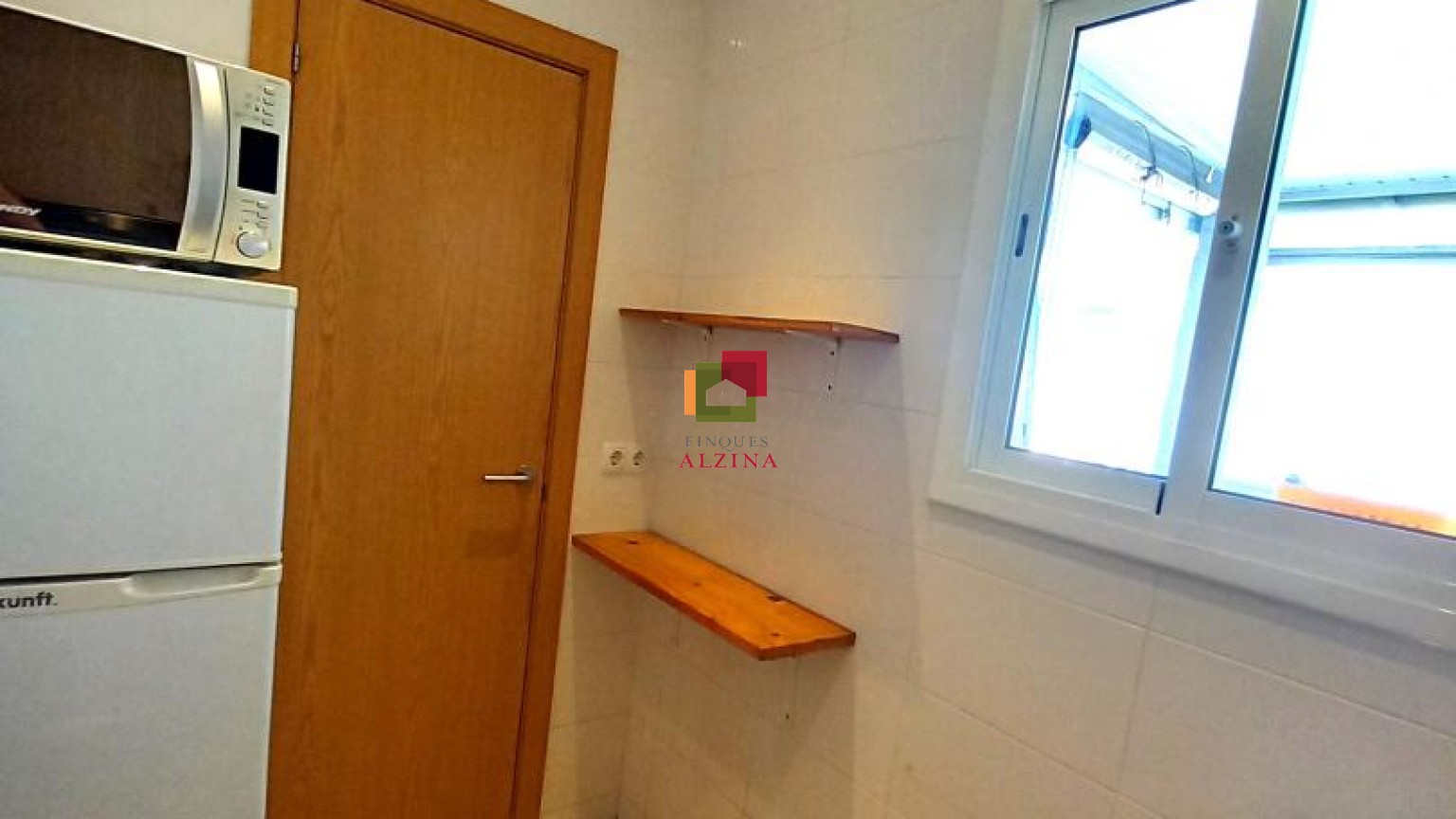 Ático Reformado con Doble Terraza en Pubilla Casa